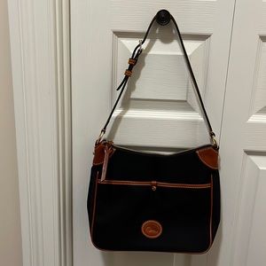 Dooney and Bourke black canvas shoulder bag.
